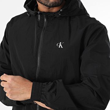 Calvin Klein - 7254 Chaqueta negra con cremallera y capucha