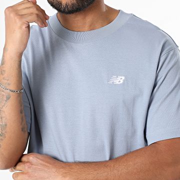 New Balance - Camiseta oversize MT41509 Azul claro