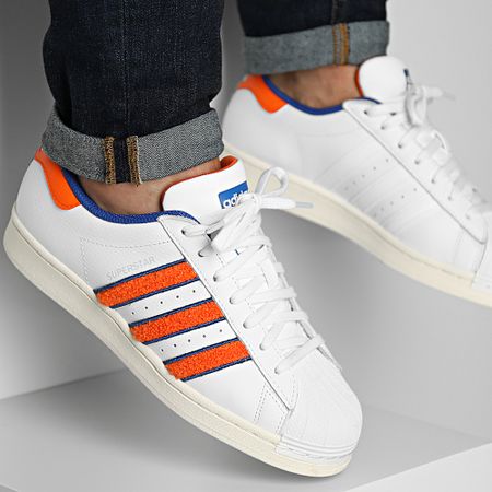 Adidas Originals - Zapatillas Superstar IF7610 Calzado Blanco Naranja Azul Real