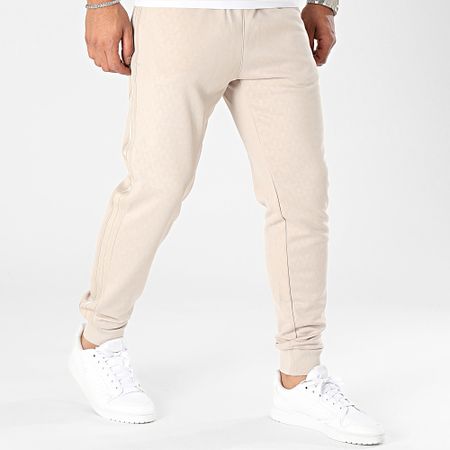 Adidas Originals - Mono Pantalón de chándal SST IJ5690 Beige