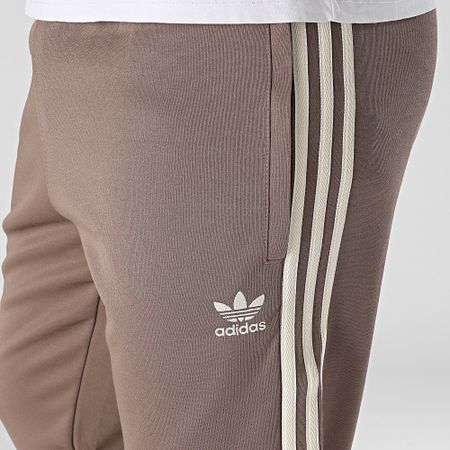 Adidas Originals - SST JP2518 Pantalón de chándal con banda marrón
