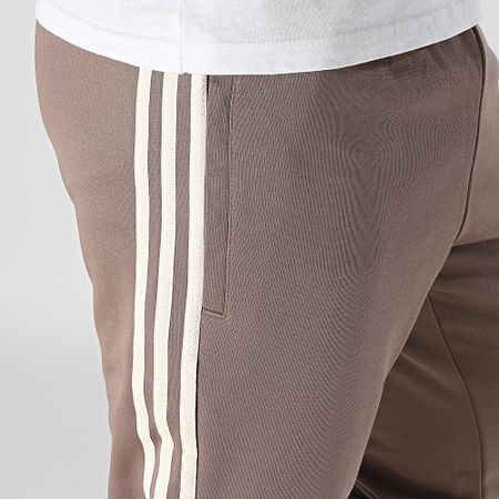 Adidas Originals - SST JP2518 Pantalón de chándal con banda marrón