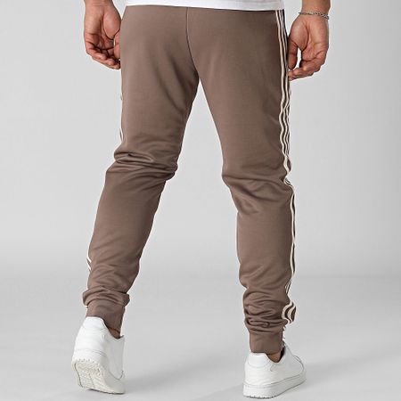 Adidas Originals - SST JP2518 Pantalón de chándal con banda marrón