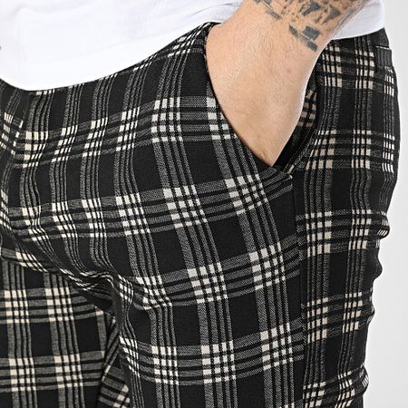 John H - 527 Pantalones pitillo a cuadros blancos y negros